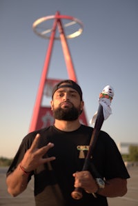 a man holding a baseball bat